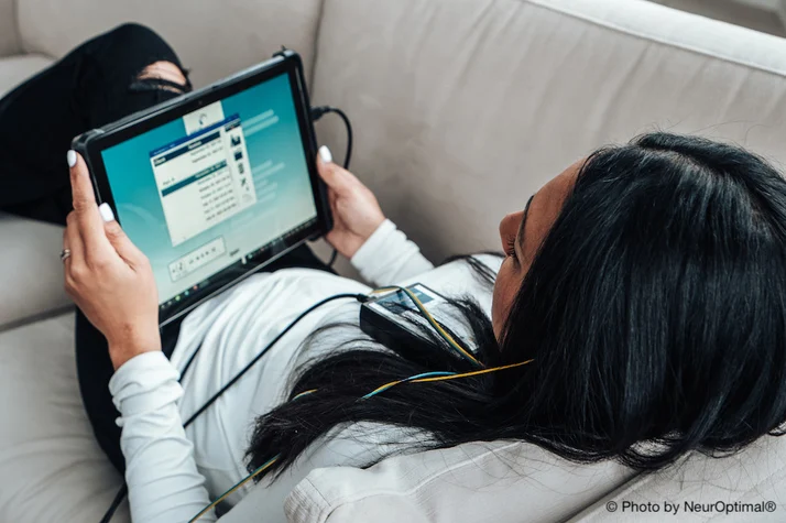 Client during NeuroOptimal neurofeedback session for ADHD treatment